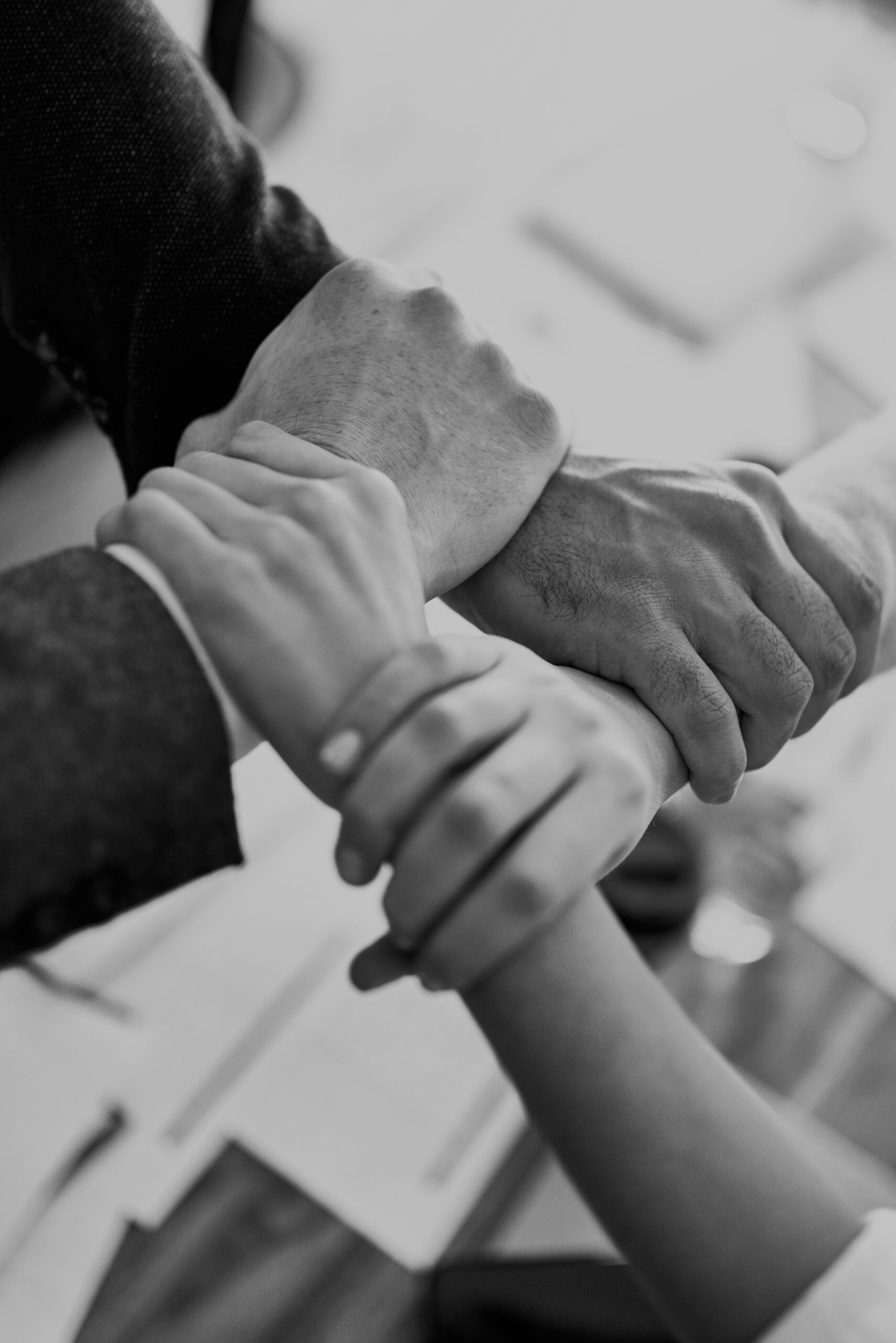 Hands joined together in collaboration